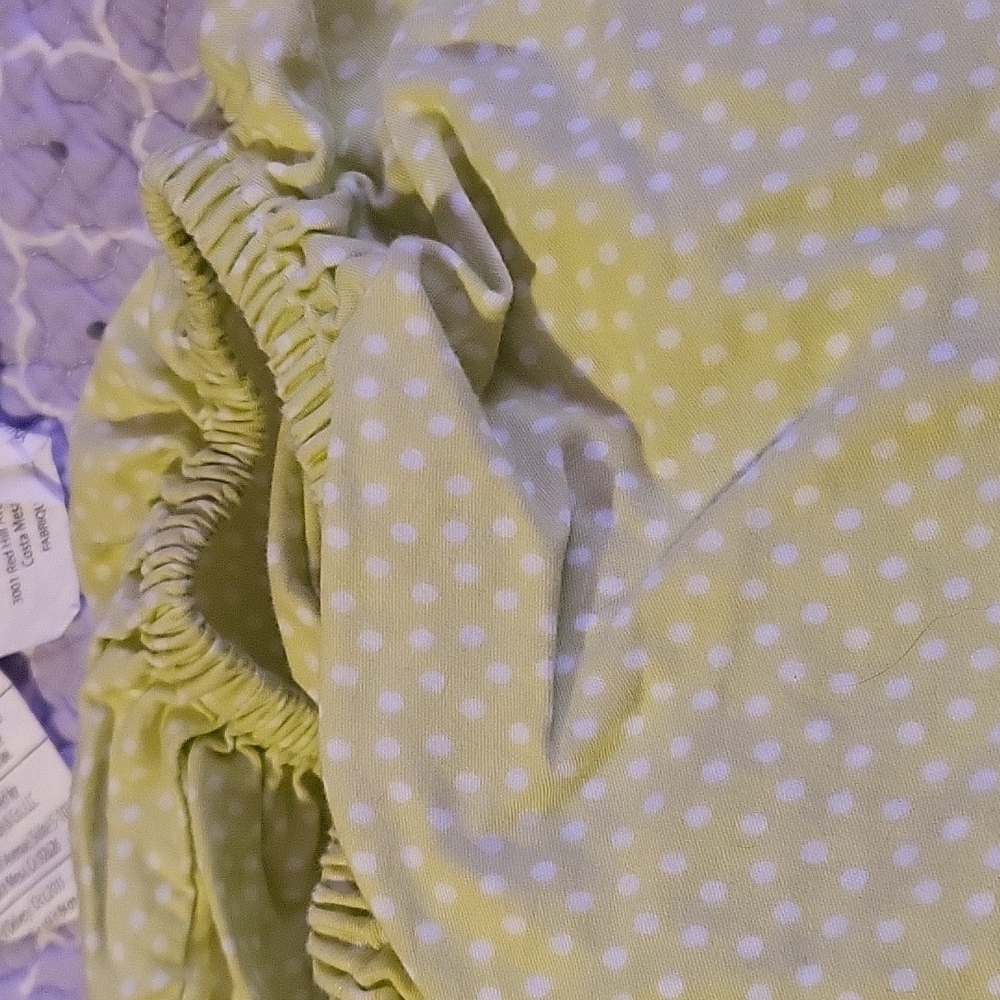 Light green crib sheet used once